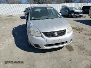 2011 Suzuki SX4 LE with VIN JS2YC5A27B6301040, listed as a Copart auction lot 47218805 with 106,474 mi miles and Salvage Title. Bid and sale history available at carsss.com. Image 11.