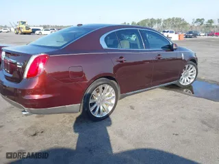 2009 Lincoln MKS with VIN 1LNHM94R89G633866, listed as a IAAI auction lot 41794698 with 136,269 mi miles. Bid and sale history available at carsss.com. Image 4.