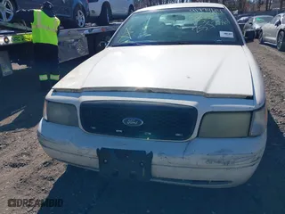2010 Ford Crown Victoria with VIN 2FABP7AV6AX138688, listed as a IAAI auction lot 41774614 with 999,999 mi miles. Bid and sale history available at carsss.com. Image 11.