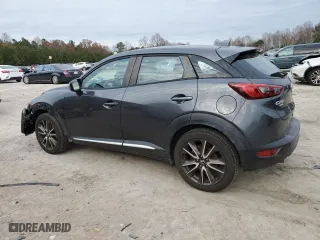 2016 Mazda CX-3 Grand Touring with VIN JM1DKBD72G0103803, listed as a Copart auction lot 82769204 with 91,727 mi miles and Salvage Title. Bid and sale history available at carsss.com. Image 2.