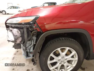 2015 Jeep Cherokee Latitude with VIN 1C4PJMCB4FW687618, listed as a IAAI auction lot 41945132 with 264,782 mi miles and . Bid and sale history available at carsss.com. Image 19.