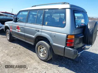 1993 Mitsubishi Montero z VIN JA4MR41H4PJ007602, wystawiony jako IAAI lot #41832401 z przebiegiem 191 549 mil mil oraz . Historia ofert i sprzedaży dostępna na DreamBid. Obrazek 3.