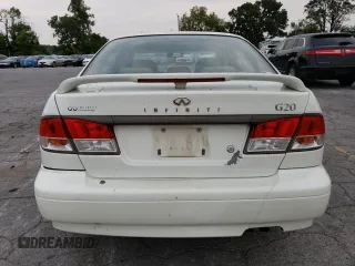 2002 Infiniti G20 Luxury z VIN JNKCP11AX2T500141, wystawiony jako Copart lot #70648434 z przebiegiem 196 559 mil mil oraz Szkody całkowita. Historia ofert i sprzedaży dostępna na DreamBid. Obrazek 6.