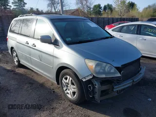 2006 Honda Odyssey EX-L with VIN 5FNRL38706B031177, listed as a IAAI auction lot 42123001 with 146,149 mi miles. Bid and sale history available at carsss.com. Image 1.