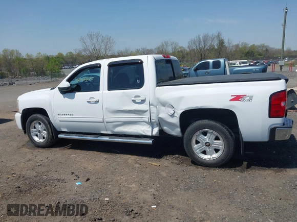 2013 Chevrolet Silverado 1500 LTZ with VIN 3GCPKTE24DG123063, listed as a IAAI auction lot 42061675 with 221,813 mi miles and . Bid and sale history available at DreamBid. Image 14.