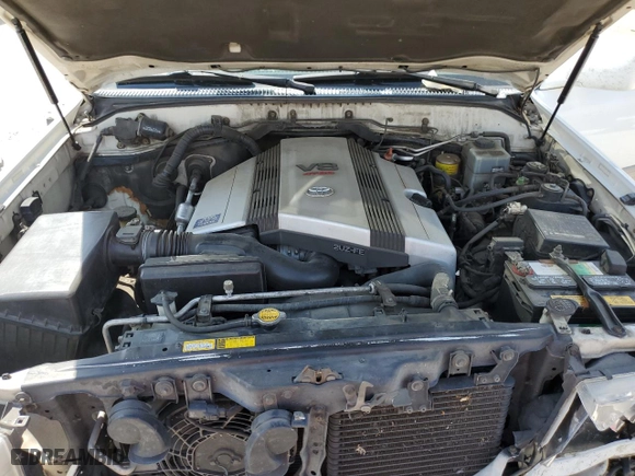 2000 Toyota Land Cruiser with VIN JT3HT05JXY0119718, listed as a Copart auction lot 71632754 with 306,887 mi miles and Salvage Title. Bid and sale history available at carsss.com. Image 12.