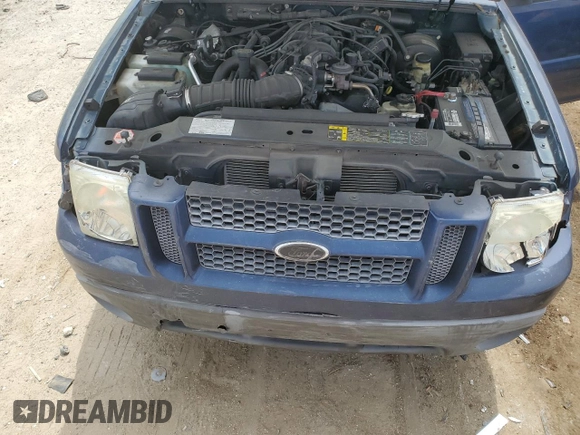 2005 Ford Explorer Sport Trac XLS with VIN 1FMDU67K95UB80915, listed as a Copart auction lot 54672085 with 182,683 mi miles and Salvage title. Bid and sale history available at DreamBid. Image 11.