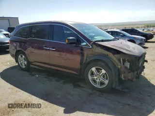 2012 Honda Odyssey Touring with VIN 5FNRL5H90CB076810, listed as a Copart auction lot 53124915 with 178,316 mi miles and Salvage Title. Bid and sale history available at DreamBid. Image 4.