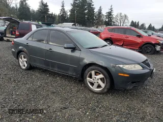 2004 Mazda 6 i with VIN 1YVFP80C045N12892, listed as a Copart auction lot 86513924 with 230,683 mi miles and Salvage Title. Bid and sale history available at DreamBid. Image 4.