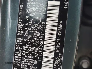 2006 Toyota Camry LE z VIN 4T1BF30K66U111210, wystawiony jako Copart lot #53107095 z przebiegiem 214 638 mil mil oraz Szkoda całkowita • Salvage title. Historia ofert i sprzedaży dostępna na DreamBid. Obrazek 12.