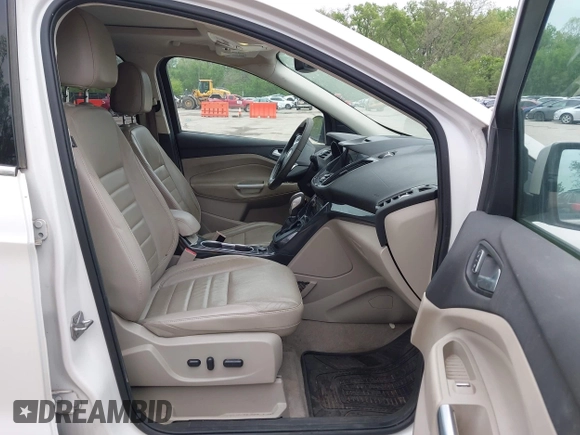 2016 Ford Escape Titanium with VIN 1FMCU9J96GUB97564, listed as a IAAI auction lot 42137663 with 269,009 mi miles. Bid and sale history available at carsss.com. Image 5.