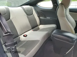 2014 Hyundai Genesis Coupe R-Spec z VIN KMHHT6KD6EU117011, wystawiony jako Copart lot #51981975 z przebiegiem 69 224 mil mil oraz Szkoda całkowita • Salvage title. Historia ofert i sprzedaży dostępna na DreamBid. Obrazek 10.