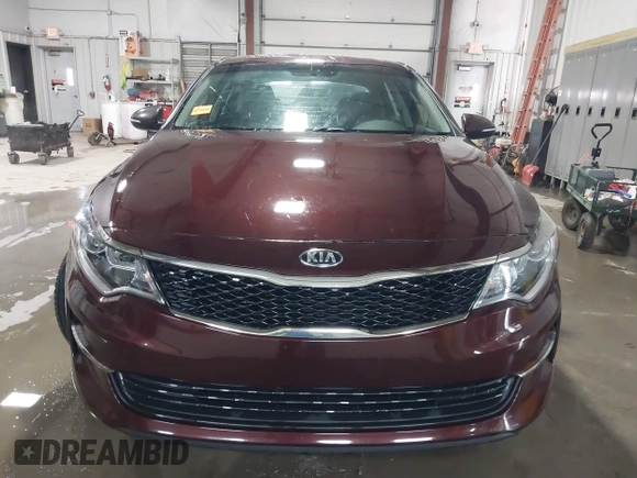 2016 Kia Optima LX with VIN 5XXGT4L3XGG073744, listed as a IAAI auction lot 41586212 with 111,628 mi miles. Bid and sale history available at carsss.com. Image 12.