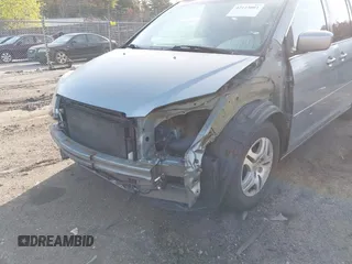 2006 Honda Odyssey EX-L with VIN 5FNRL38706B031177, listed as a IAAI auction lot 42123001 with 146,149 mi miles. Bid and sale history available at carsss.com. Image 6.