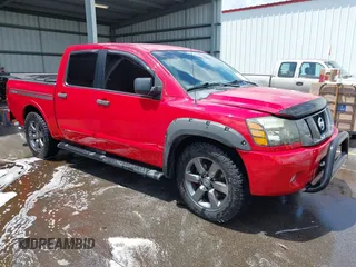 2012 Nissan Titan SV with VIN 1N6BA0EK1CN301719, listed as a IAAI auction lot 42511371 with 215,187 mi miles and . Bid and sale history available at DreamBid. Image 1.