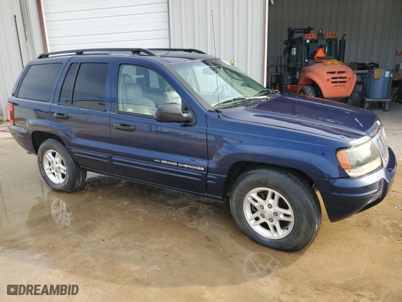 2004 Jeep Grand Cherokee Laredo with VIN 1J4GX48N54C333603, listed as a Copart auction lot 42620514 with 172,410 mi miles and Non Repairable. Bid and sale history available at carsss.com. Image 4.