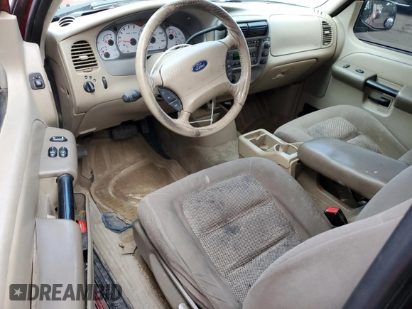 2003 Ford Explorer Sport XLS z VIN 1FMZU70E93UC11352, wystawiony jako Copart lot #84494984 z przebiegiem 188 874 mil mil oraz Szkoda całkowita • Salvage title. Historia ofert i sprzedaży dostępna na DreamBid. Obrazek 8.
