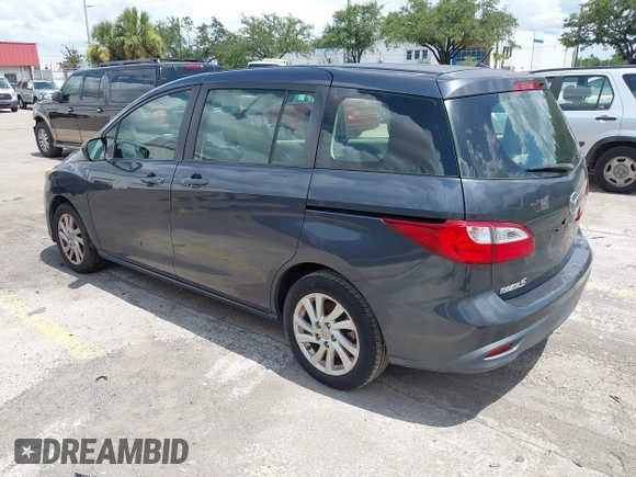 2012 Mazda 5 Sport with VIN JM1CW2BL8C0131745, listed as a IAAI auction lot 42625411 with 194,875 mi miles and . Bid and sale history available at DreamBid. Image 3.