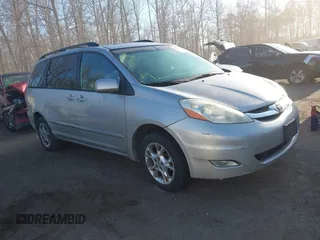 2006 Toyota Sienna XLE z VIN 5TDBA22C26S064443, wystawiony jako IAAI lot #41767456 z przebiegiem 165 629 mil mil oraz . Historia ofert i sprzedaży dostępna na DreamBid. Obrazek 1.