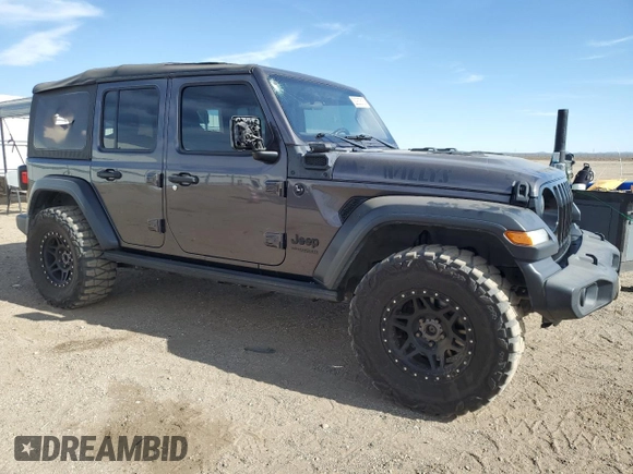 2020 Jeep Wrangler Unlimited Willys with VIN 1C4HJXDG5LW246978, listed as a Copart auction lot 52930515 with 117,020 mi miles and Salvage title. Bid and sale history available at DreamBid. Image 4.