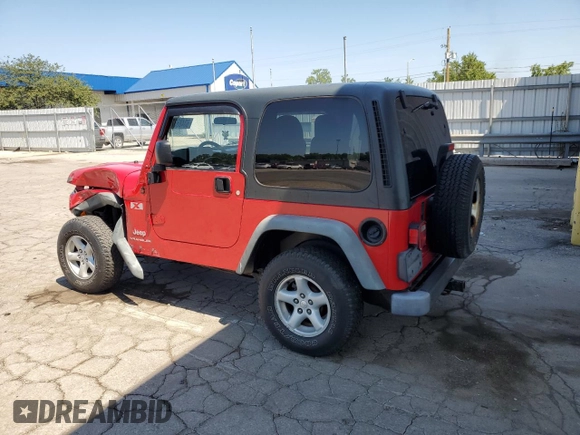 2005 Jeep Wrangler X with VIN 1J4FA39S35P360241, listed as a Copart auction lot 63486375 with 85,051 mi miles and Salvage title. Bid and sale history available at DreamBid. Image 2.