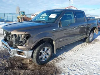 2015 Ford F-150 XLT with VIN 1FTEW1EP4FFC24409, listed as a IAAI auction lot 41306158 with 155,249 mi miles. Bid and sale history available at carsss.com. Image 20.