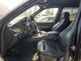 2012 BMW X5 35i z VIN 5UXZV4C51CL744313, wystawiony jako Copart lot #58270755 z przebiegiem 97 903 mil mil oraz Szkoda całkowita • Salvage title. Historia ofert i sprzedaży dostępna na DreamBid. Obrazek 7.