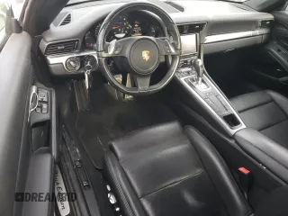 2016 Porsche 911 Carrera with VIN WP0AA2A91GS106403, listed as a Copart auction lot 83393454 with 115,592 mi miles and Salvage title. Bid and sale history available at DreamBid. Image 8.