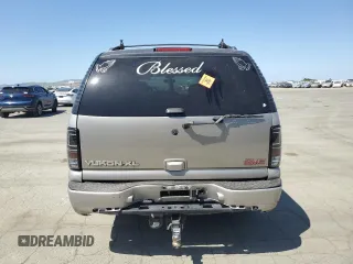 2006 GMC Yukon XL with VIN 1GKFK66U36J134459, listed as a Copart auction lot 55802165 with 277,366 mi miles and Salvage title. Bid and sale history available at DreamBid. Image 6.