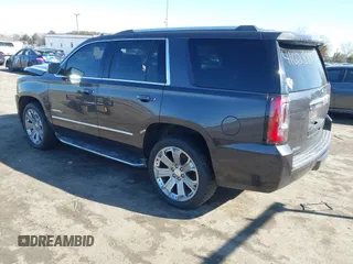 2016 GMC Yukon Denali with VIN 1GKS2CKJ0GR252965, listed as a IAAI auction lot 41628897 with 109,828 mi miles. Bid and sale history available at carsss.com. Image 3.