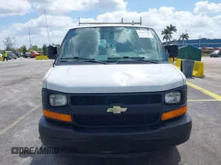 2014 Chevrolet Express Cargo Van with VIN 1GCWGFFA2E1103446, listed as a IAAI auction lot 42177760 with 91,232 mi miles. Bid and sale history available at carsss.com. Image 6.
