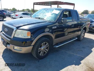 2005 Ford F-150 XLT with VIN 1FTRX12545KD69019, listed as a IAAI auction lot 42710675 with Not provided miles and . Bid and sale history available at DreamBid. Image 2.