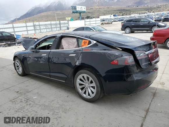 2016 Tesla Model S 90D with VIN 5YJSA1E23GF167938, listed as a Copart auction lot 51703075 with Not provided miles and Salvage title. Bid and sale history available at DreamBid. Image 2.