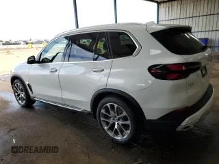 2025 BMW X5 xDrive40i z VIN 5UX23EU03S9Z14103, wystawiony jako Copart lot #56754705 z przebiegiem 2 983 mil mil oraz Czysty tytuł • Clean title. Historia ofert i sprzedaży dostępna na DreamBid. Obrazek 2.