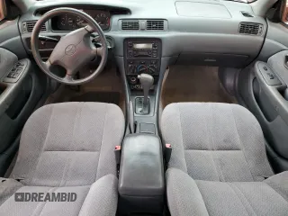 2000 Toyota Camry CE z VIN 4T1BG22K3YU649970, wystawiony jako Copart lot #55654425 z przebiegiem 220 076 mil mil oraz Szkoda całkowita • Salvage title. Historia ofert i sprzedaży dostępna na DreamBid. Obrazek 8.
