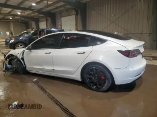 2021 Tesla Model 3 Standard Range Plus with VIN 5YJ3E1EA5MF987000, listed as a Copart auction lot 87638485 with Not Provided miles and Salvage Title. Bid and sale history available at DreamBid. Image 2.