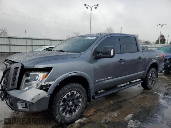 2018 Nissan Titan Pro-4X z VIN 1N6AA1E51JN536680, wystawiony jako Copart lot #82361724 z przebiegiem 98 699 mil mil oraz Szkoda całkowita • Salvage title. Historia ofert i sprzedaży dostępna na DreamBid. Obrazek 1.