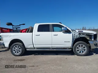 2023 Ram 2500 Laramie with VIN 3C6UR5FJ9PG530727, listed as a IAAI auction lot 41803946 with 19,992 mi miles and . Bid and sale history available at DreamBid. Image 14.