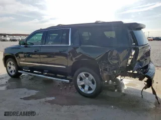2019 Chevrolet Suburban LT with VIN 1GNSCHKC5KR296872, listed as a Copart auction lot 50264235 with 150,329 mi miles and Salvage Title. Bid and sale history available at carsss.com. Image 2.