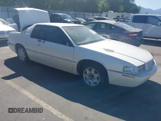 1996 Cadillac Eldorado Touring ETC z VIN 1G6ET1296TU601167, wystawiony jako IAAI lot #42531227 z przebiegiem 137 121 mil mil oraz . Historia ofert i sprzedaży dostępna na DreamBid. Obrazek 1.