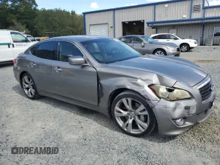 2011 Infiniti M with VIN JN1BY1AP9BM322203, listed as a Copart auction lot 73536594 with 253,376 mi miles and Salvage Title. Bid and sale history available at DreamBid. Image 4.