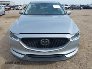 2017 Mazda CX-5 Grand Touring with VIN JM3KFBDL8H0227348, listed as a IAAI auction lot 41572377 with 124,908 mi miles. Bid and sale history available at carsss.com. Image 12.