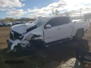 2018 GMC Canyon 4WD Denali z VIN 1GTG6EENXJ1279158, wystawiony jako Copart lot #80252894 z przebiegiem 86 873 mil mil oraz Szkoda całkowita • Salvage title. Historia ofert i sprzedaży dostępna na DreamBid. Obrazek 1.