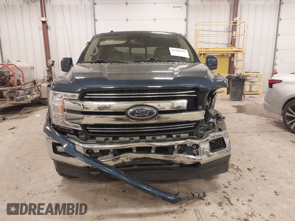 2018 Ford F-150 XL with VIN 1FTEW1EP4JFA00923, listed as a IAAI auction lot 41506293 with 153,523 mi miles and . Bid and sale history available at DreamBid. Image 12.