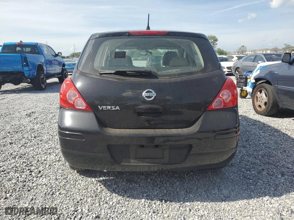 2009 Nissan Versa 1.8 S with VIN 3N1BC13EX9L498529, listed as a Copart auction lot 52096575 with 119,697 mi miles and Salvage Title. Bid and sale history available at carsss.com. Image 6.