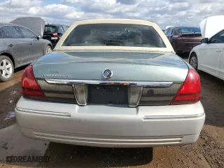 2006 Mercury Grand Marquis GS with VIN 2MEFM74V56X638847, listed as a Copart auction lot 46915875 with 143,199 mi miles and Salvage Title. Bid and sale history available at carsss.com. Image 6.