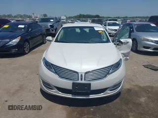 2013 Lincoln MKZ z VIN 3LN6L2G90DR824857, wystawiony jako IAAI lot #42229016 z przebiegiem Nie podano mil oraz . Historia ofert i sprzedaży dostępna na DreamBid. Obrazek 12.