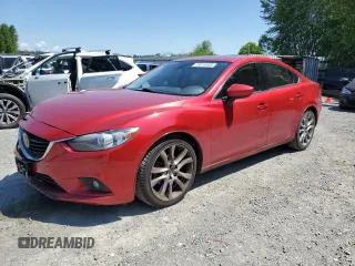 2014 Mazda 6 i Grand Touring с VIN JM1GJ1W5XE1108003, выставлен на аукционе Copart как лот 59816565 с пробегом 126 599 миль миль и Списание • Salvage title. История ставок и продаж доступна на DreamBid. Изображение 1.