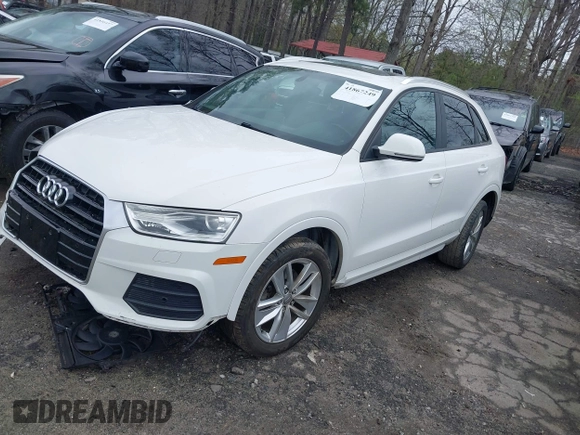 2017 Audi Q3 Premium z VIN WA1BCCFS2HR009908, wystawiony jako IAAI lot #41867249 z przebiegiem 116 804 mil mil oraz . Historia ofert i sprzedaży dostępna na DreamBid. Obrazek 16.