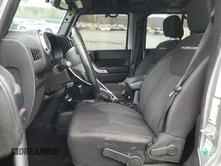 2014 Jeep Wrangler Unlimited Rubicon with VIN 1C4BJWFG7EL197252, listed as a Copart auction lot 44798205 with 115,778 mi miles and Salvage Title. Bid and sale history available at carsss.com. Image 7.